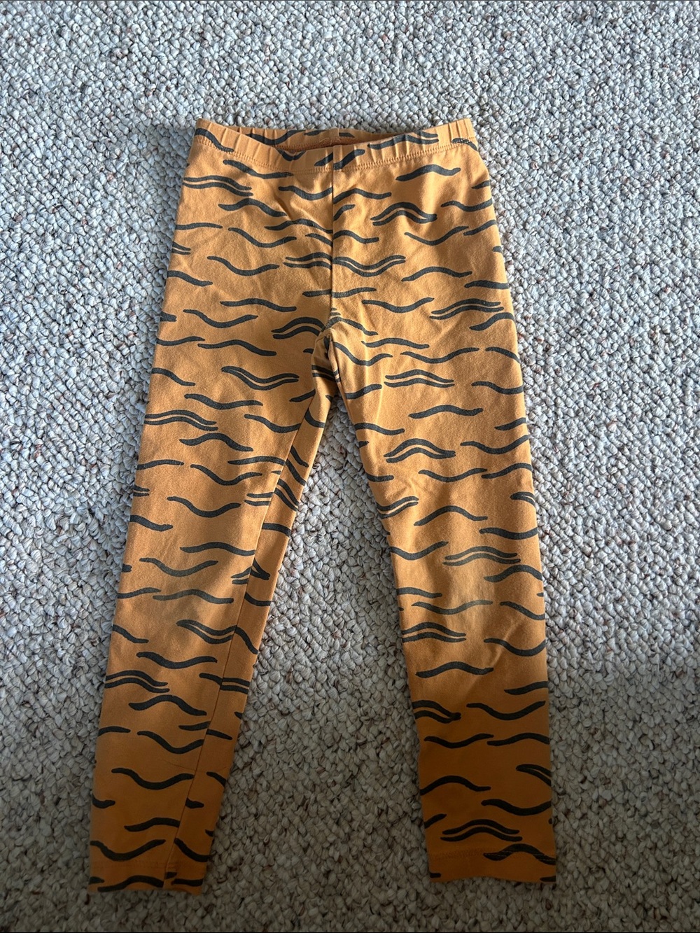 Tea Collection Pale Orange and Black Tiger Print Leggings